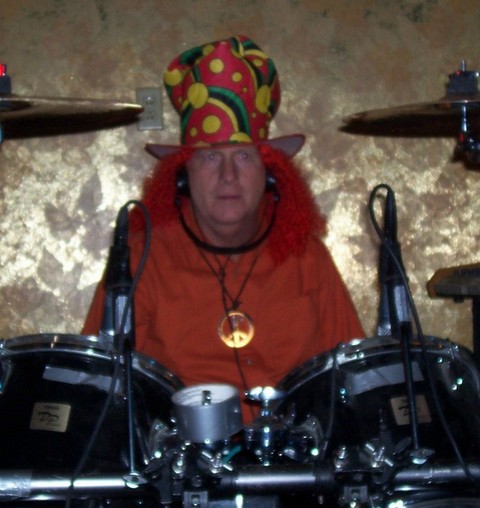 Who is this clowning around on the drums?